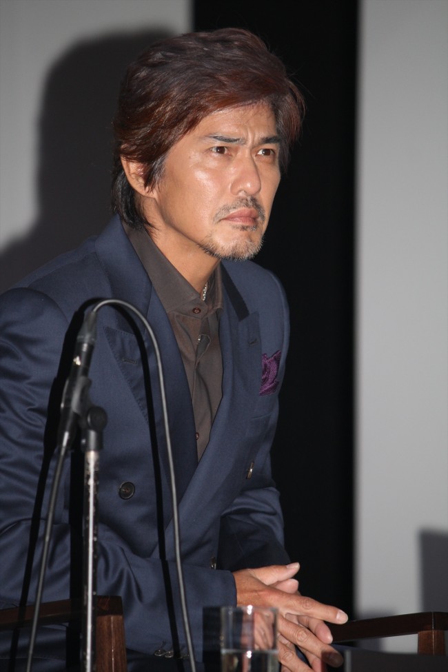 『許されざる者』完成報告記者会見に登場した佐藤浩市
