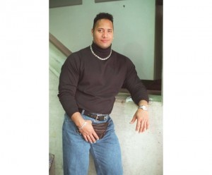 ドウェイン・ ジョンソン／腰にはウエストポーチを付け、髪型もなかなか衝撃的な90年代の写真