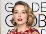 アンバー・ハード、裁判後初のインタビューでジョニー・デップを「愛している」と語る